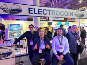 Electrocoin - John Stergides (centre) with sons John A (right) and Gabino (left)